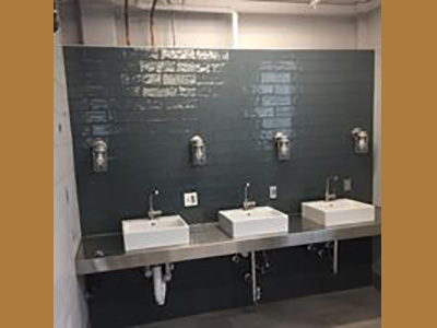 Upchurch Builders Nonprofit Construction bathroom sinks