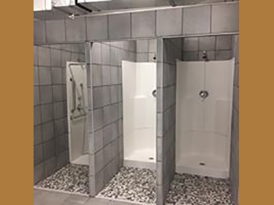 Upchurch Builders Nonprofit Construction showers stalls