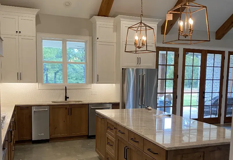 Custom kitchen design featuring natural wood beams.