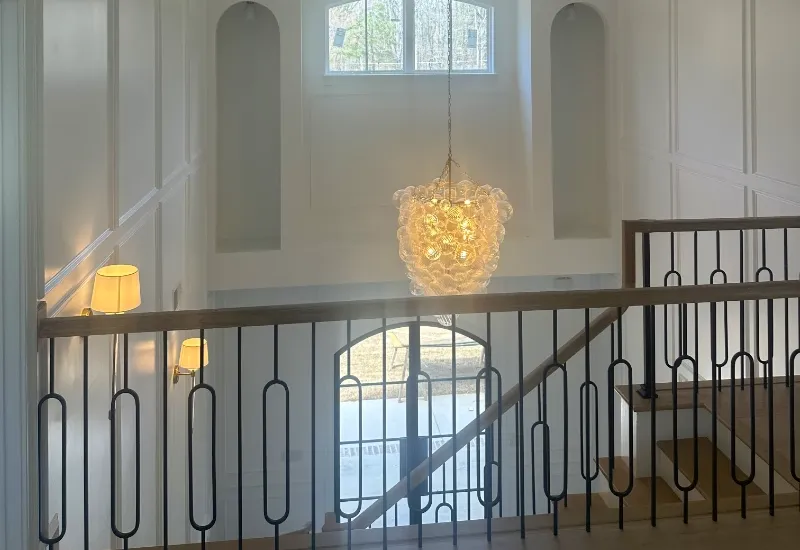 Beautiful loft overlooking iron railing.